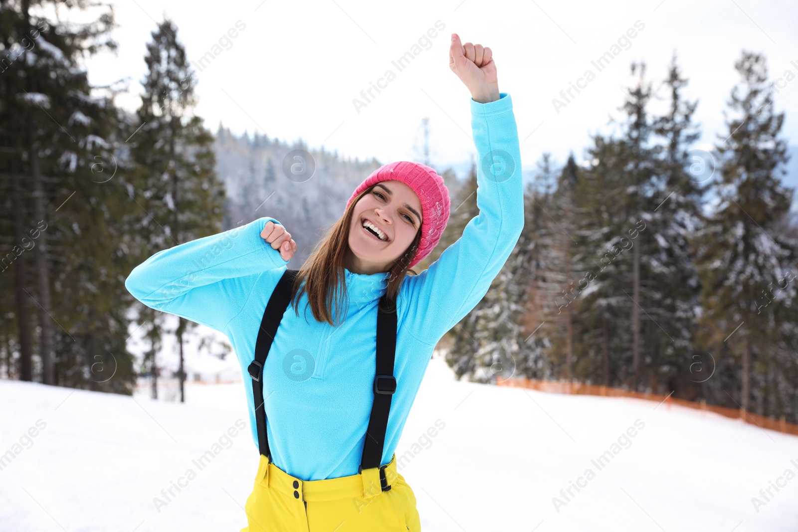 Photo of Young woman at mountain resort. Winter vacation