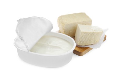 Photo of Tasty tofu and cream cheese on white background