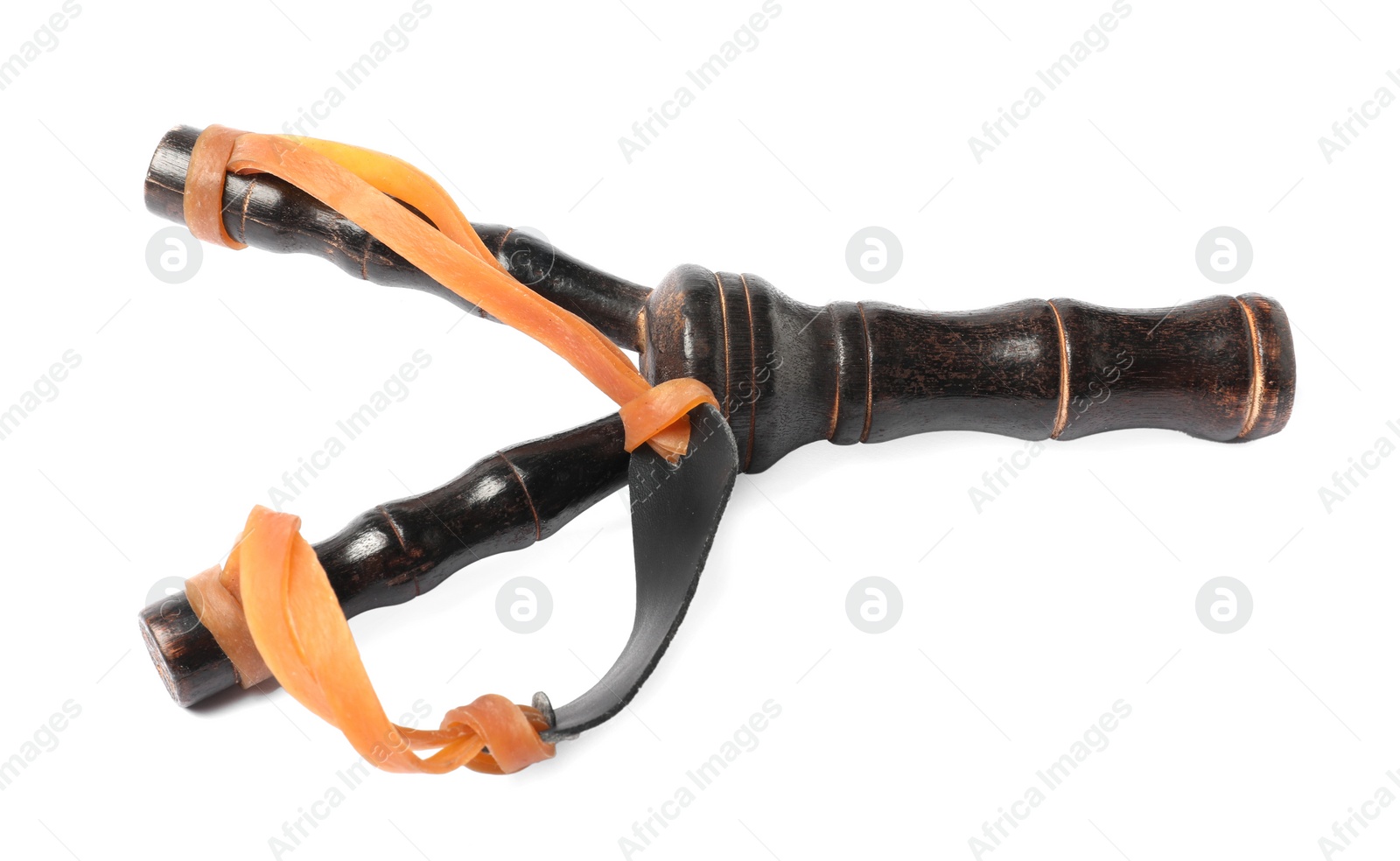 Photo of Black wooden slingshot with leather pouch on white background