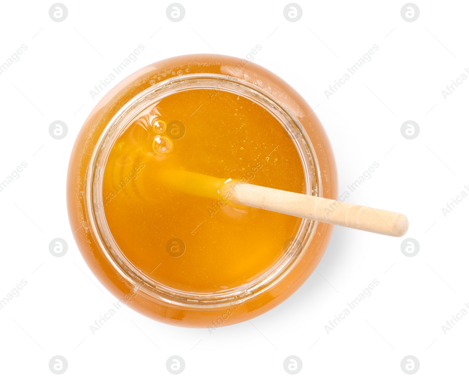 Photo of Tasty honey and dipper in glass jar isolated on white, top view