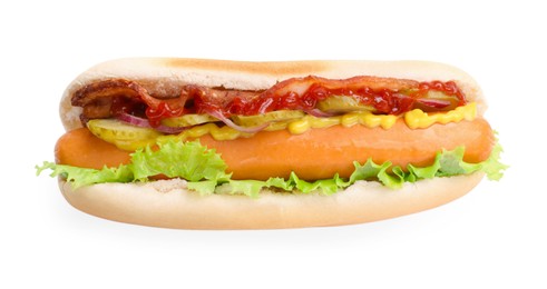 Photo of Tasty hot dog with bacon, lettuce and pickle isolated on white, top view