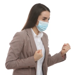 Photo of Businesswoman with protective mask in fighting pose on white background. Strong immunity concept