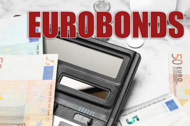 Eurobonds concept. Calculator and money on marble background, closeup