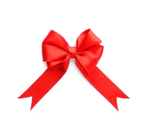 Photo of Red ribbon bow on white background, top view