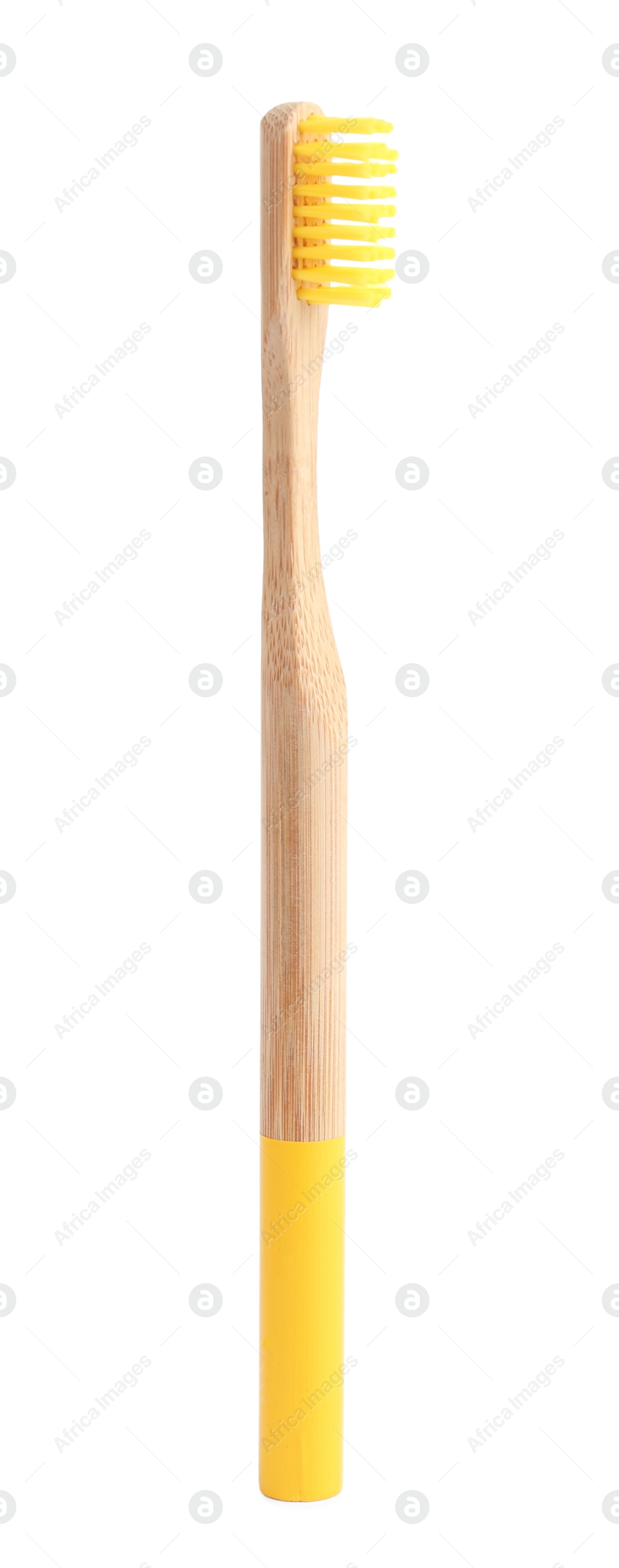 Photo of Bamboo toothbrush with yellow bristle isolated on white