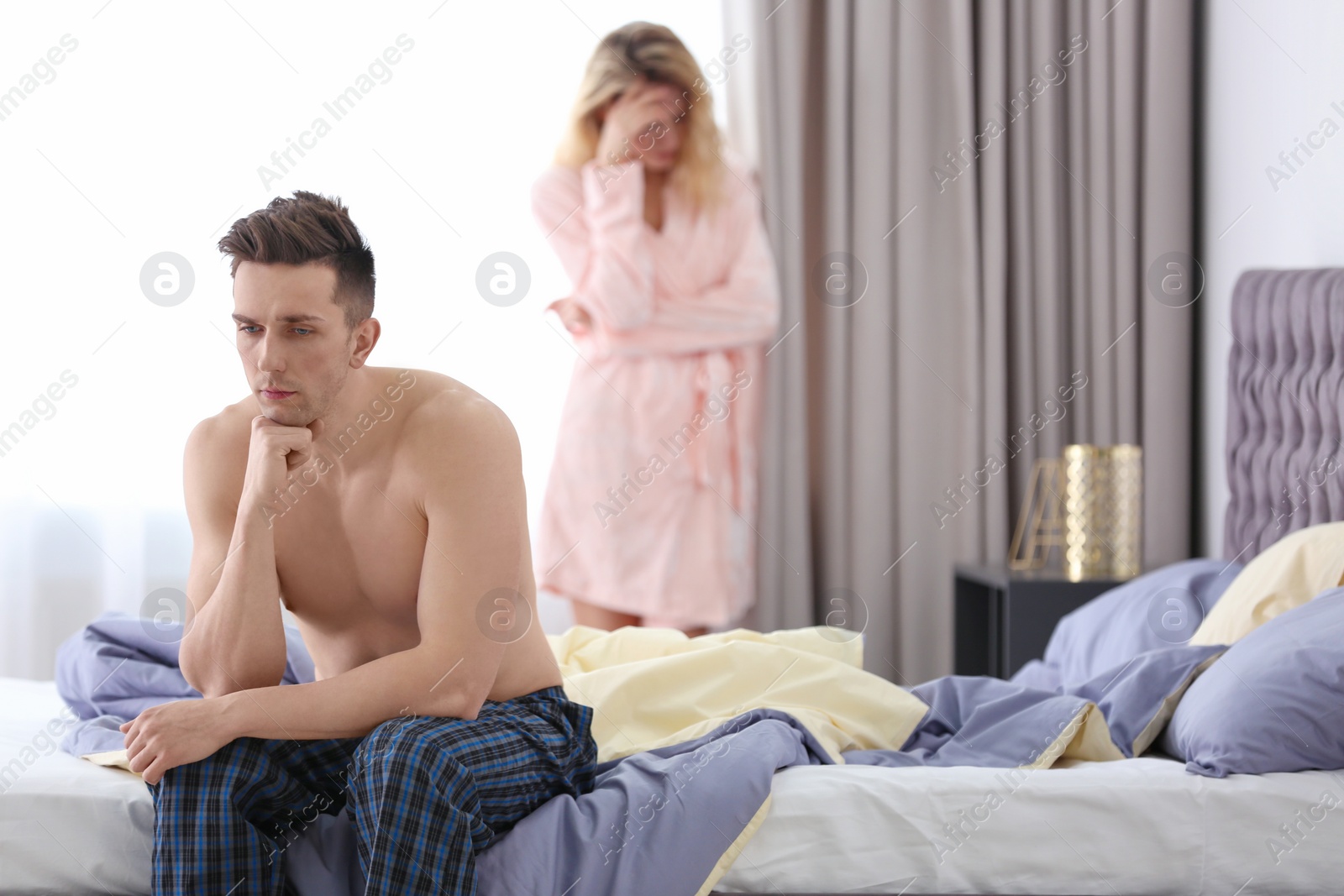 Photo of Young couple with relationship problem at home