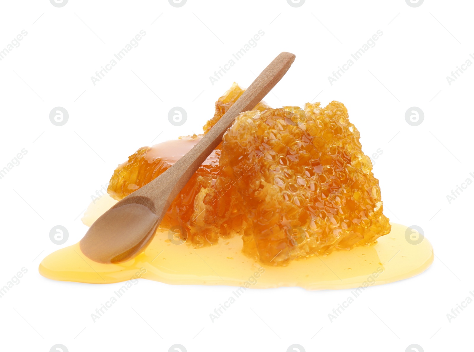 Photo of Fresh honeycombs and spoon on white background