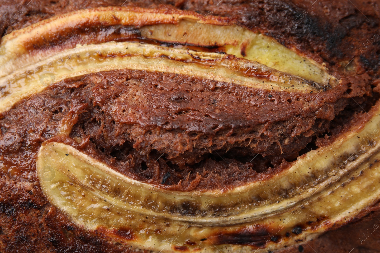 Photo of Delicious homemade banana bread as background, closeup
