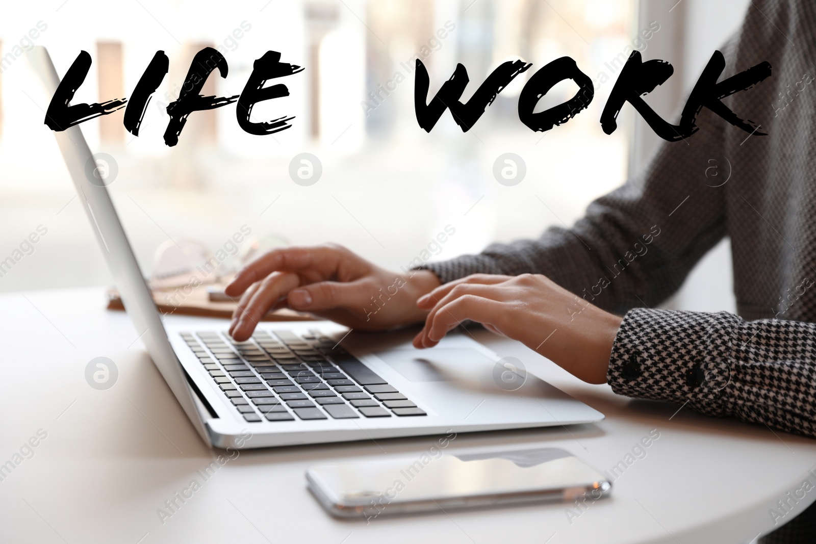 Image of Woman with laptop at table indoors, closeup. Concept of balance between work and life