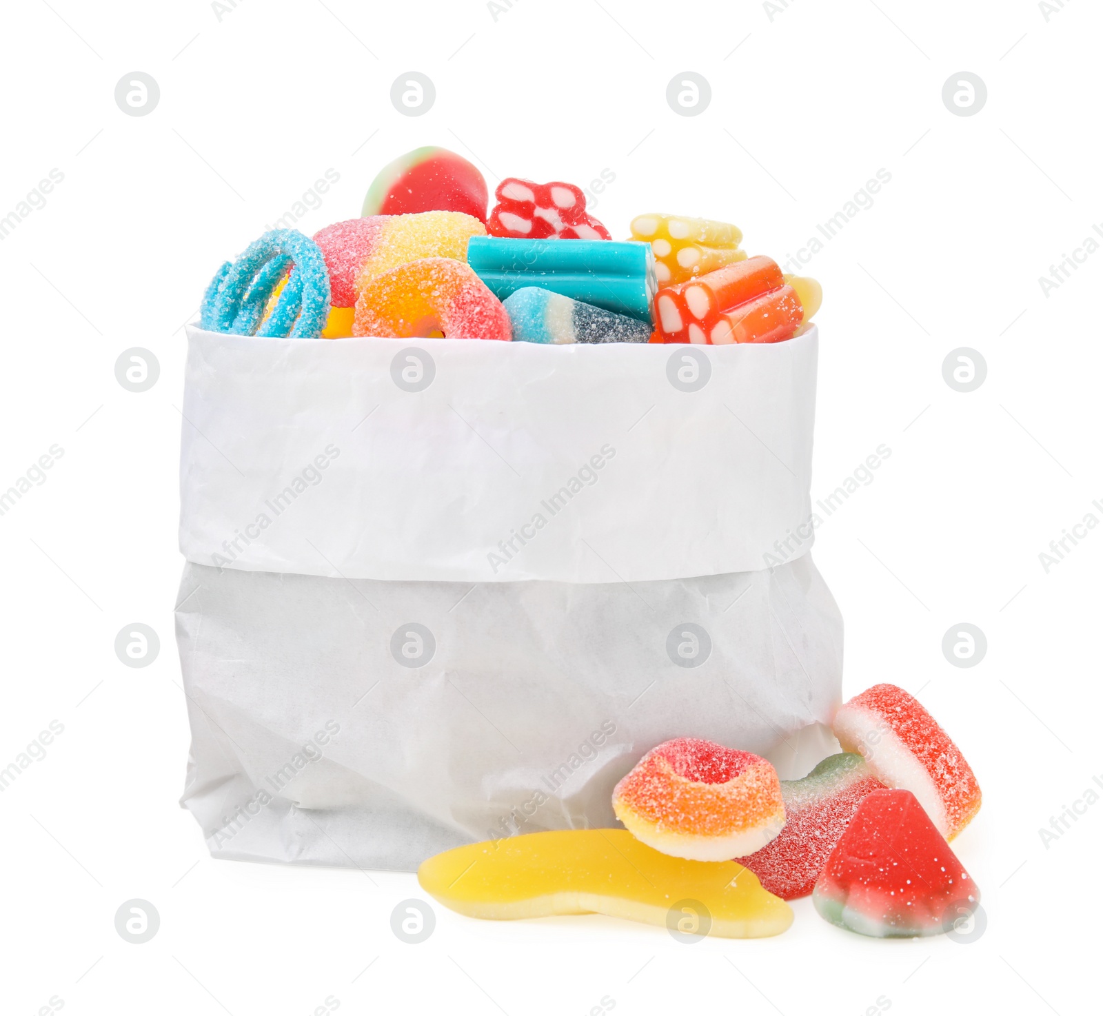 Photo of Paper bag of tasty colorful jelly candies on white background