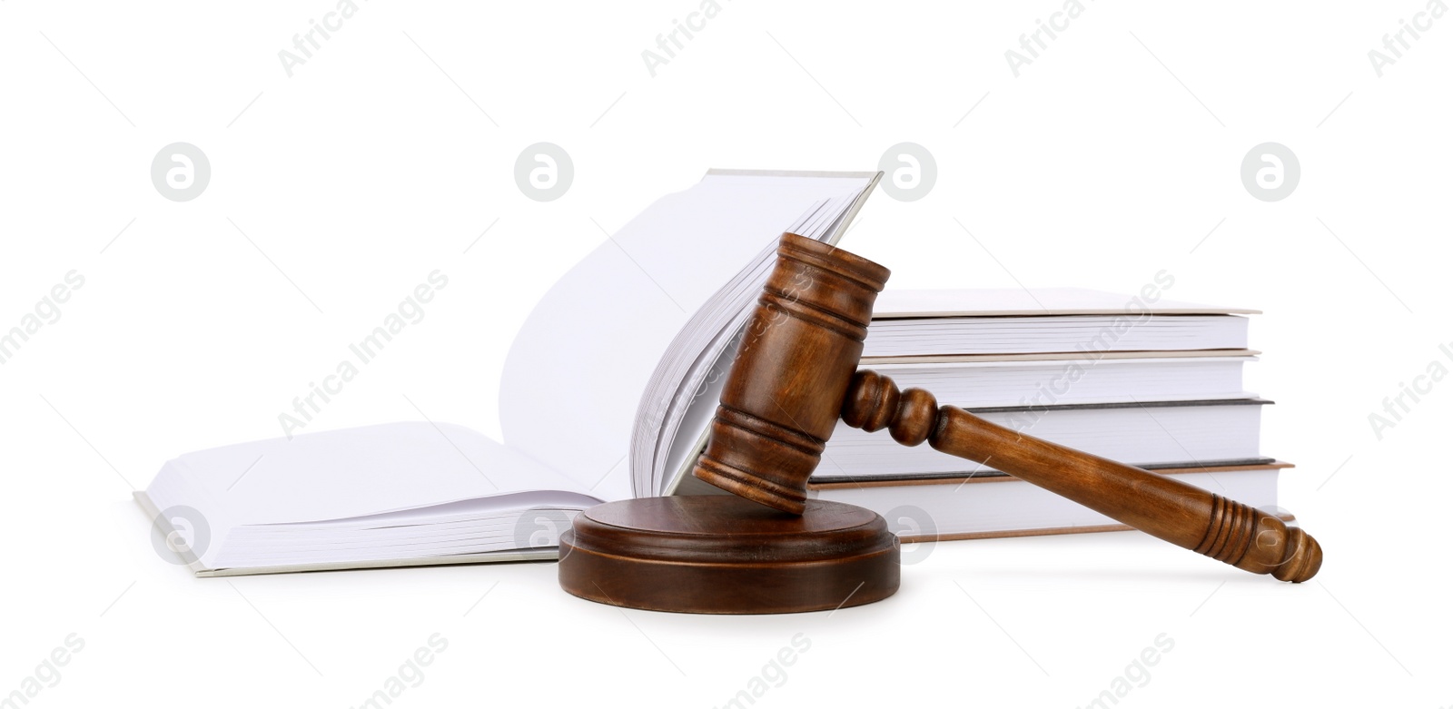 Photo of Wooden gavel and books on white background