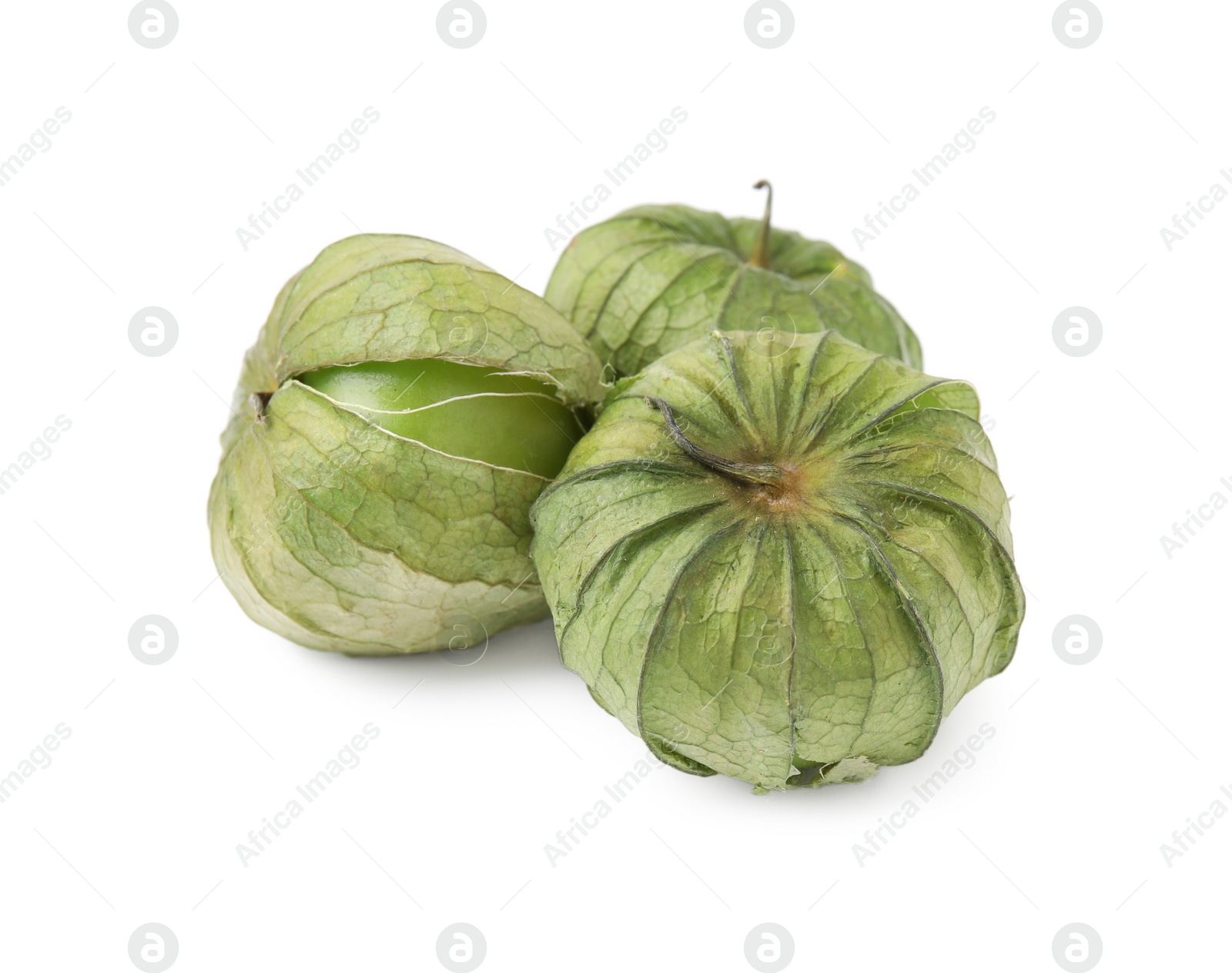 Photo of Fresh green tomatillos with husk isolated on white