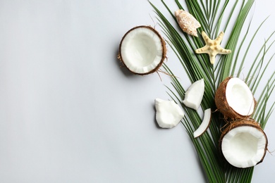 Photo of Creative composition with coconuts on white background, top view