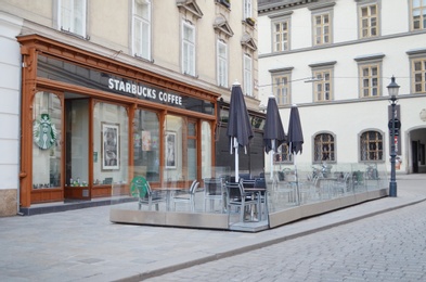 Photo of VIENNA, AUSTRIA - JUNE 18, 2018: Starbucks coffee shop on city street