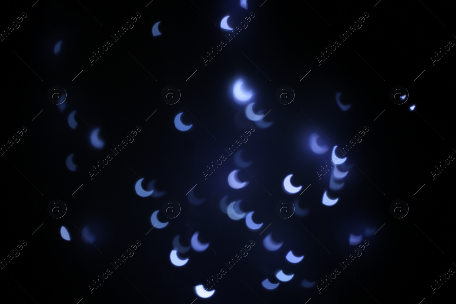 Photo of Beautiful crescent shaped lights on dark background