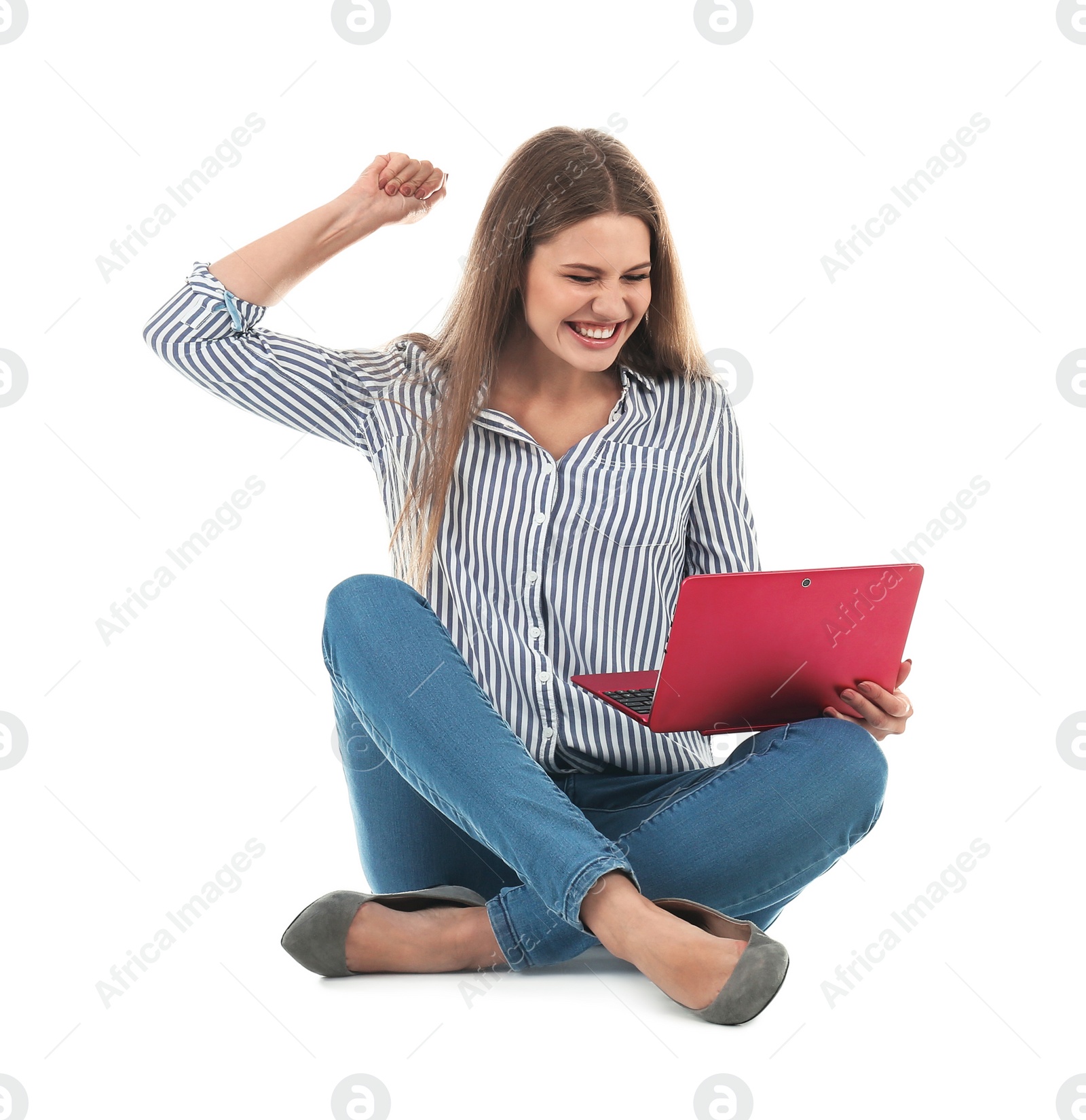 Photo of Emotional young woman with laptop celebrating victory on white background