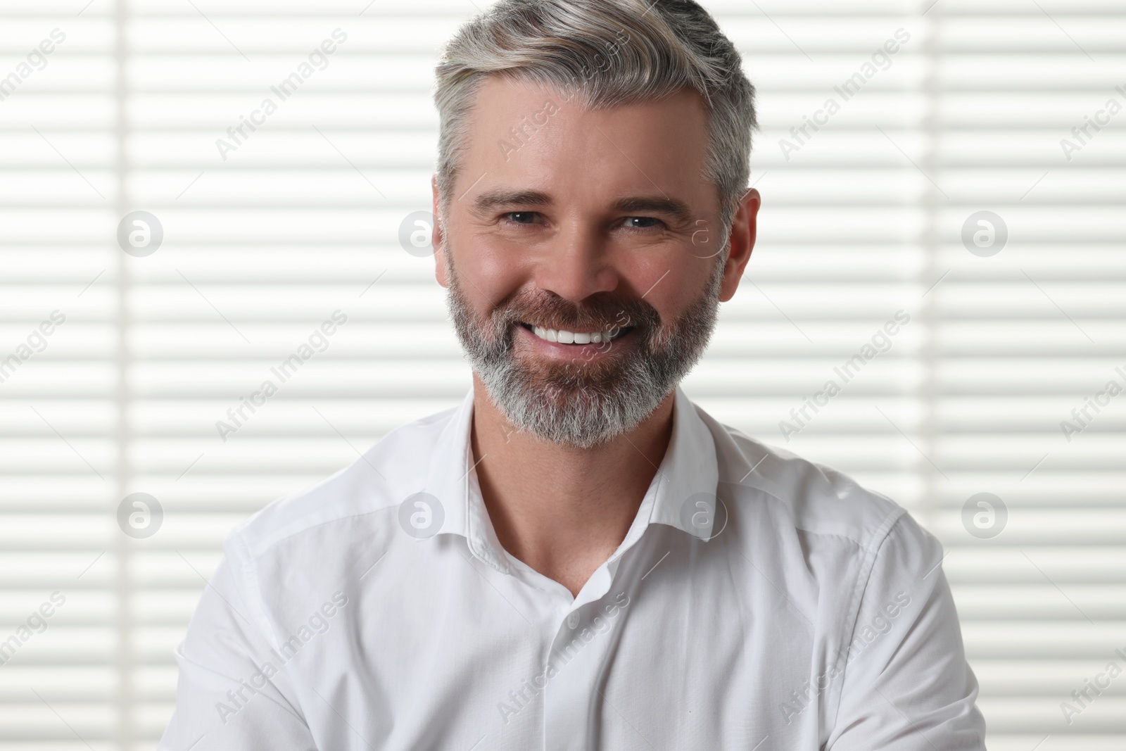 Photo of Happy man having video call at home, view from web camera