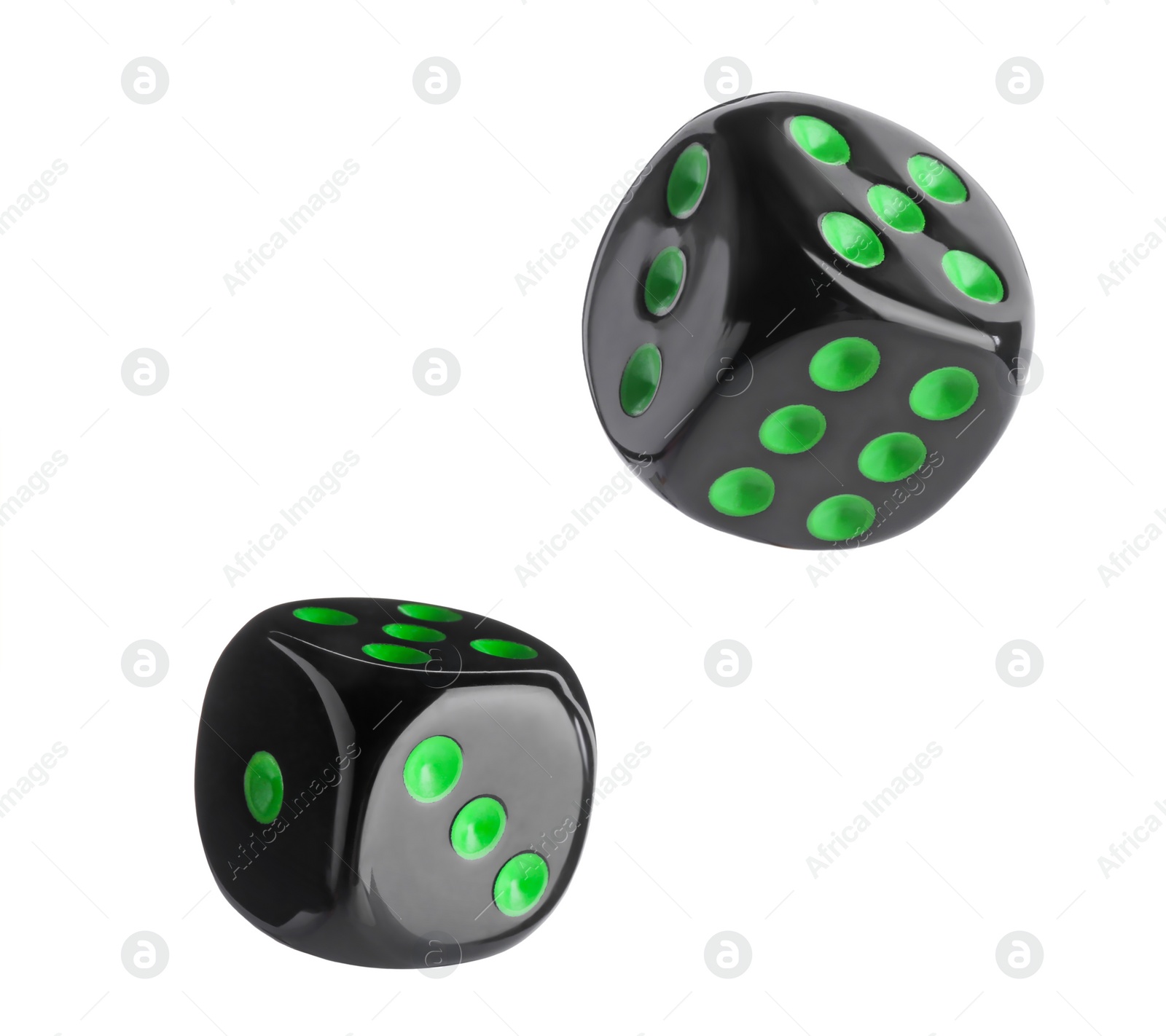 Image of Two black dice in air on white background