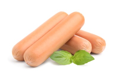 Photo of Delicious boiled sausages and basil on white background