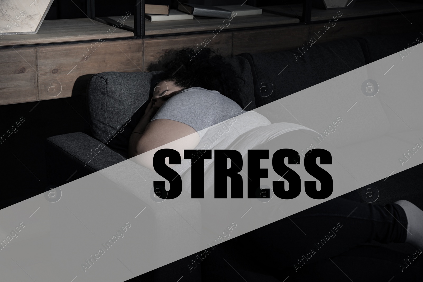 Image of Word STRESS and overweight woman sleeping on sofa at home