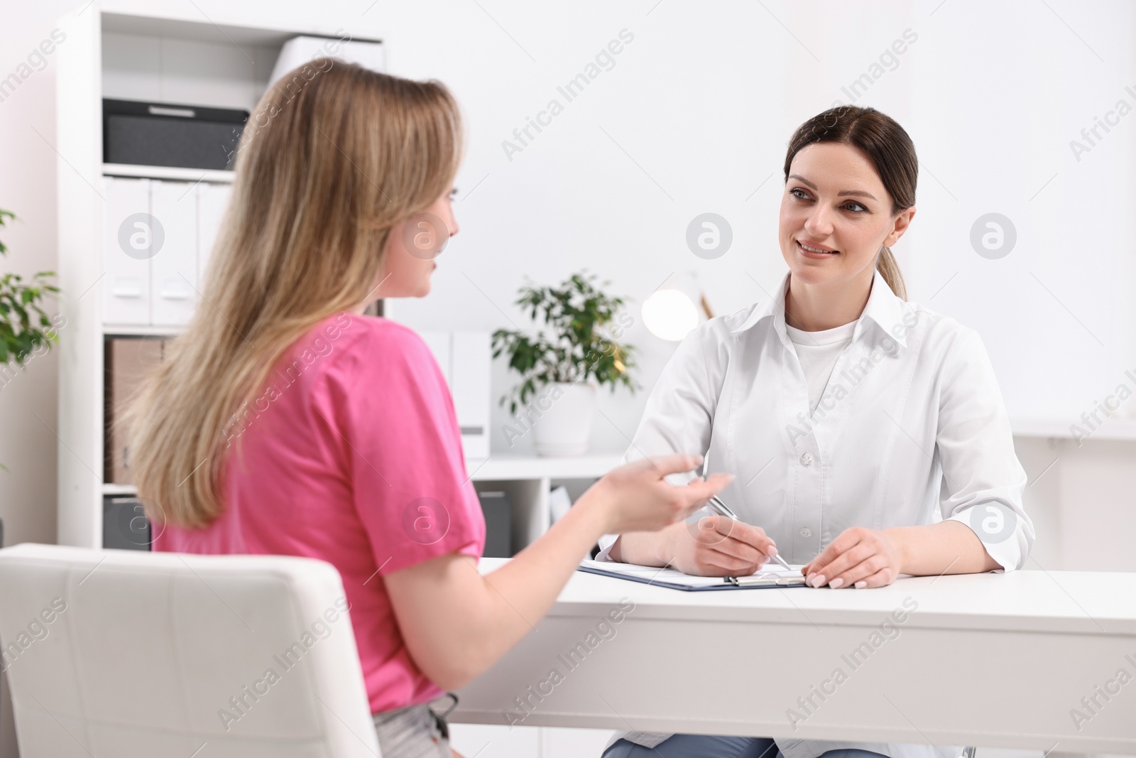 Photo of Mammologist consulting woman during appointment in hospital