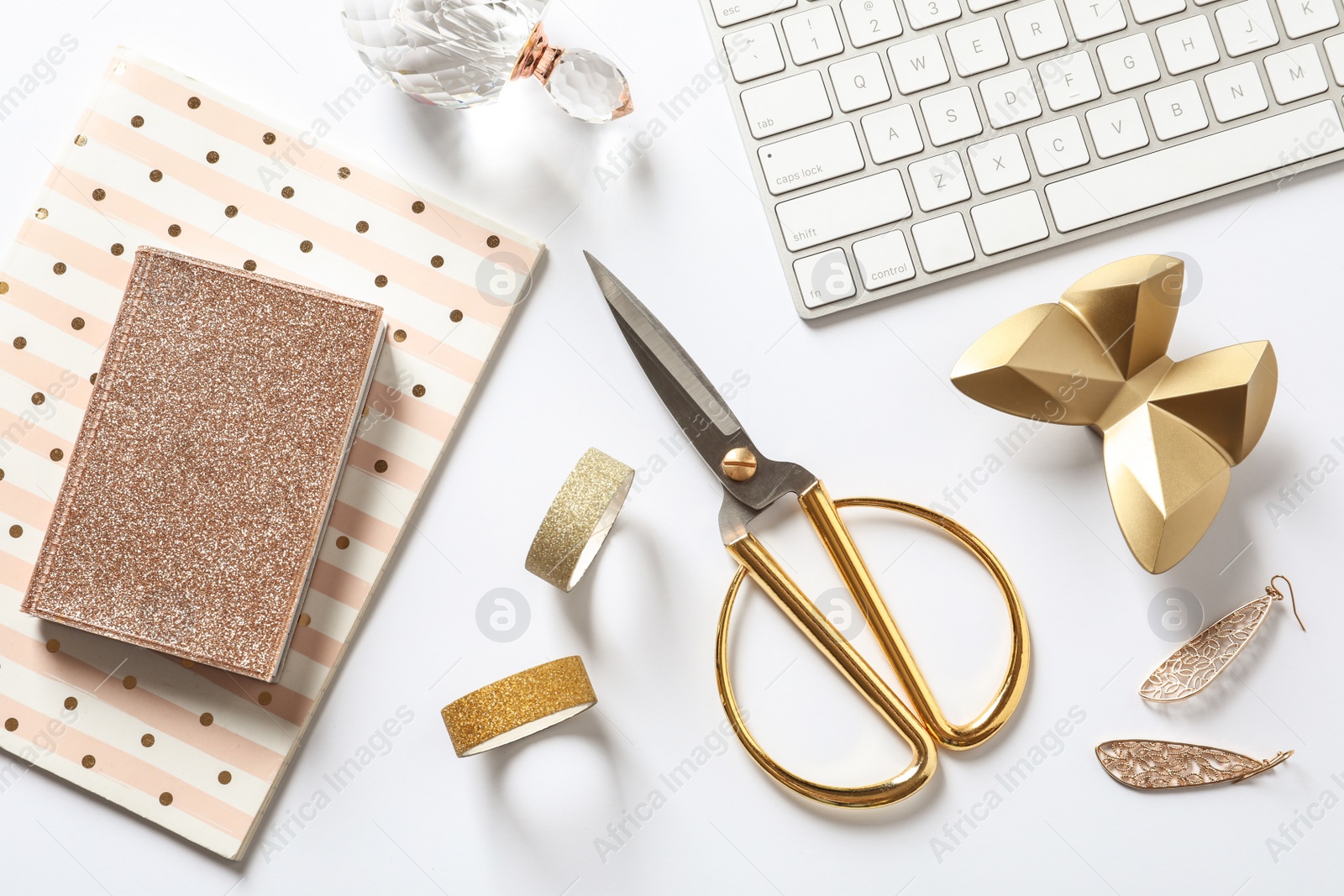 Photo of Composition with scissors, keyboard and notebooks on white background, top view