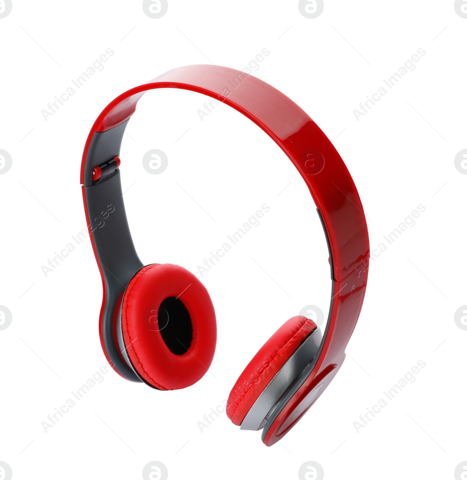 Photo of Stylish modern headphones with earmuffs on white background