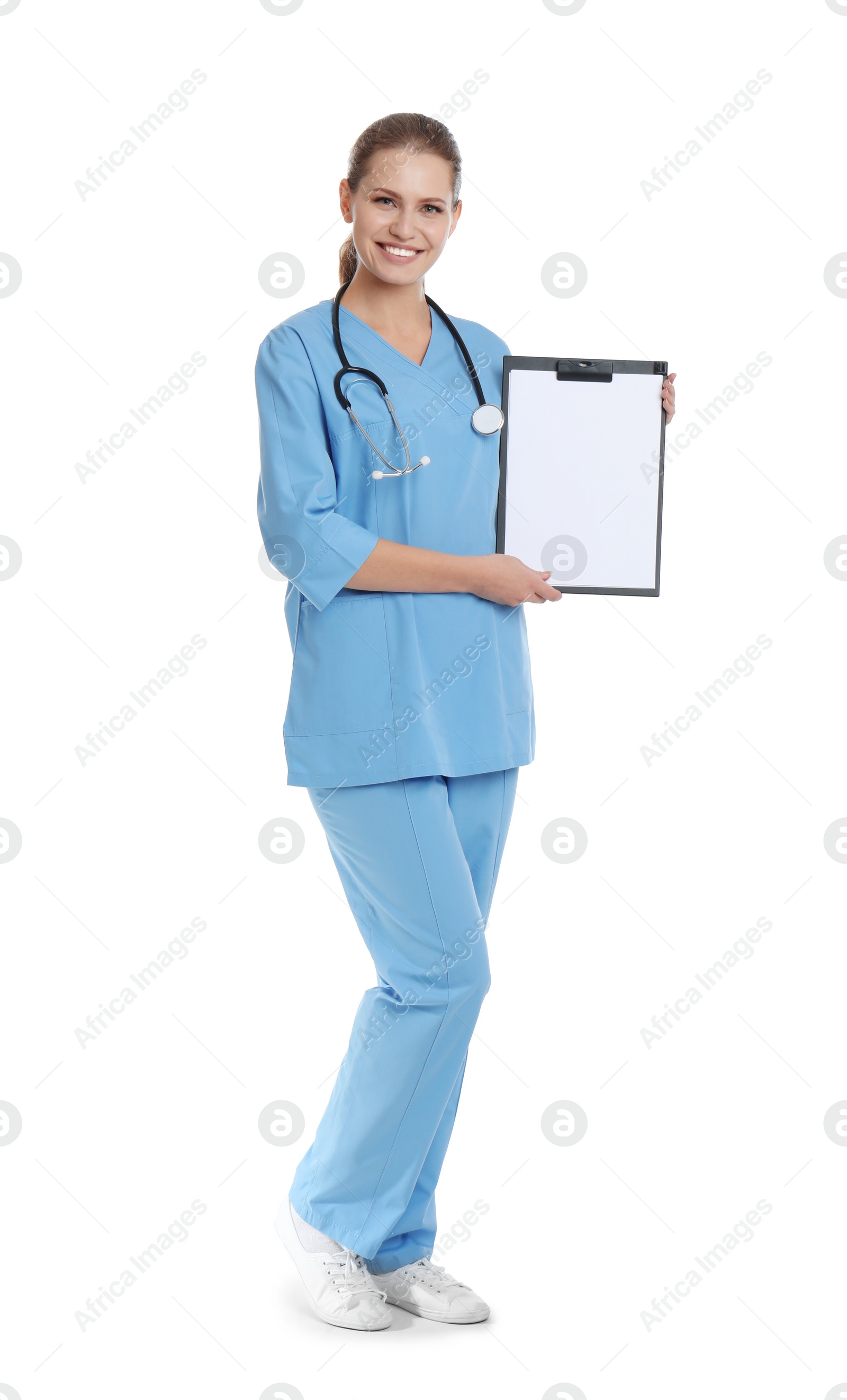 Photo of Full length portrait of young medical assistant with stethoscope and clipboard on white background. Space for text