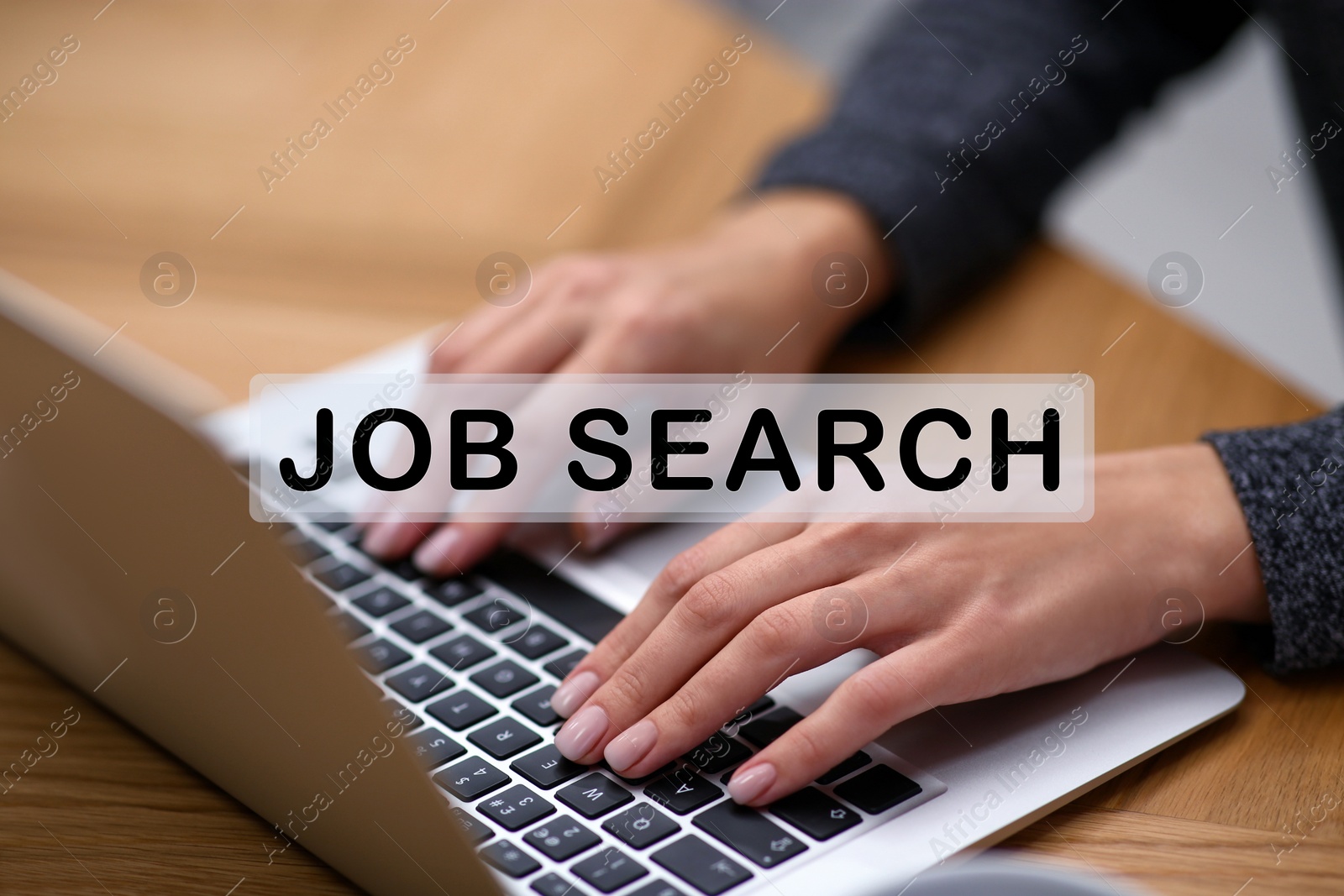 Image of Woman working on modern laptop at table, closeup. Job search