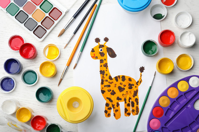 Photo of Flat lay composition with child's painting of giraffe on white wooden table