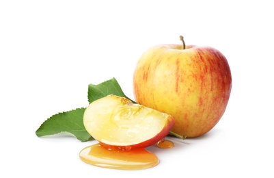 Tasty apples and honey on white background