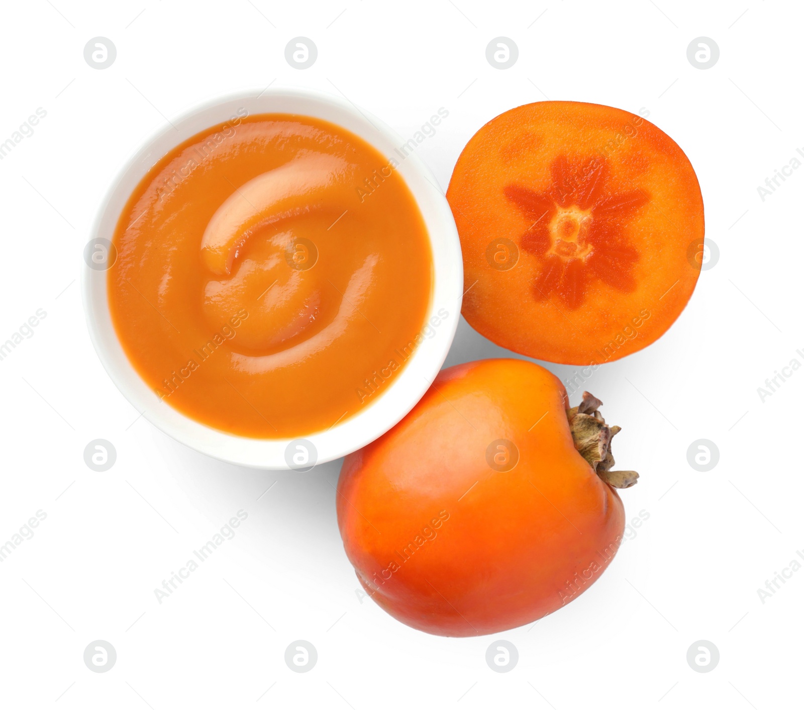 Photo of Delicious persimmon jam and fresh fruits isolated on white, top view