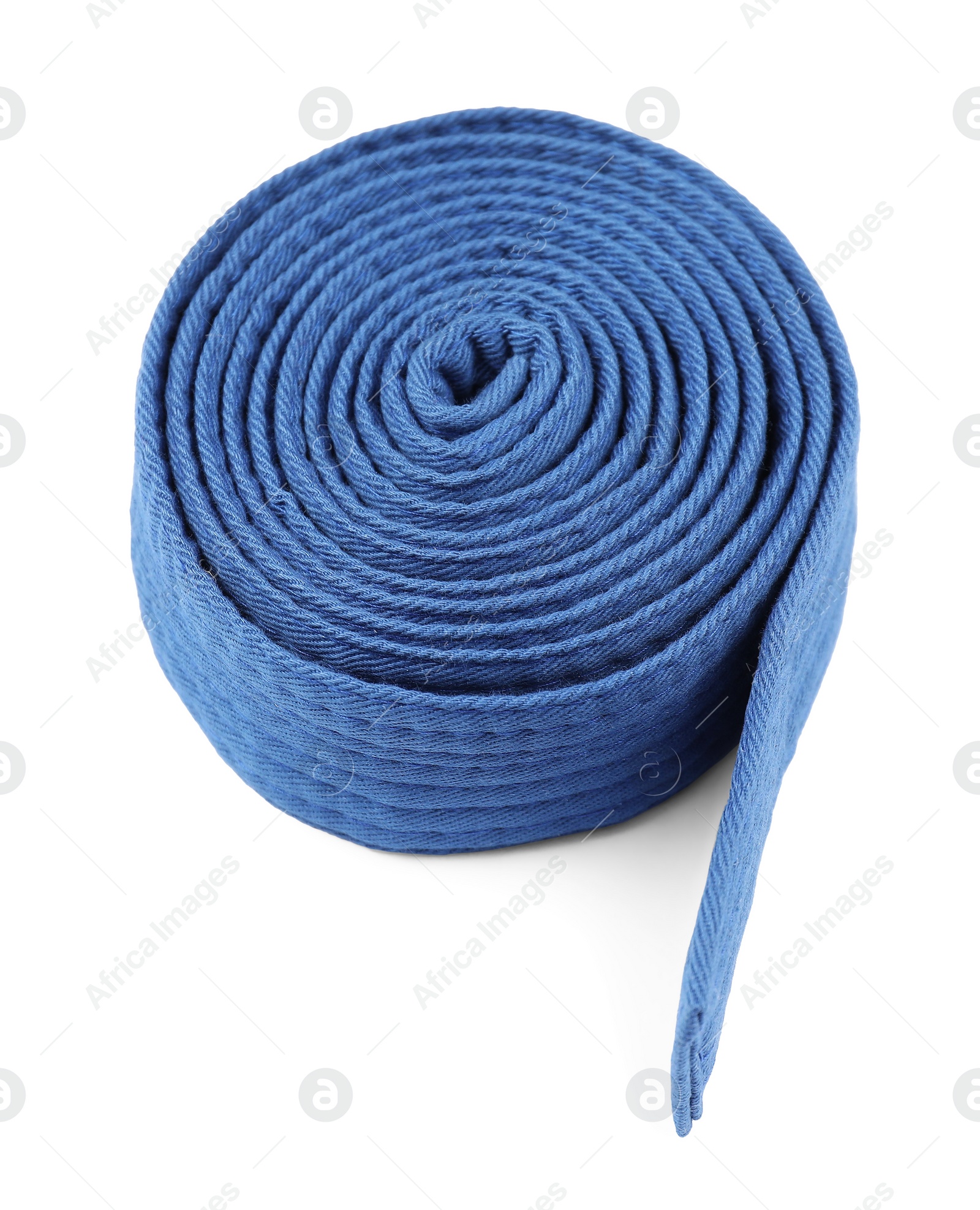 Photo of Blue karate belt isolated on white. Martial arts uniform