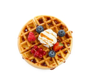 Photo of Tasty Belgian waffle with ice cream, berries and caramel syrup on white background, top view