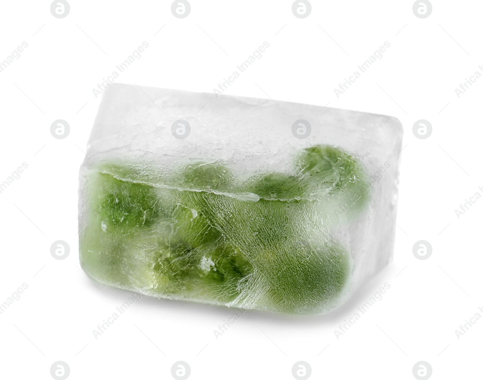 Photo of Green peas in ice cube on white background. Frozen vegetables