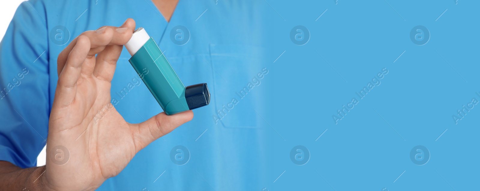 Image of Closeup view of male doctor holding asthma inhaler, space for text. Banner design