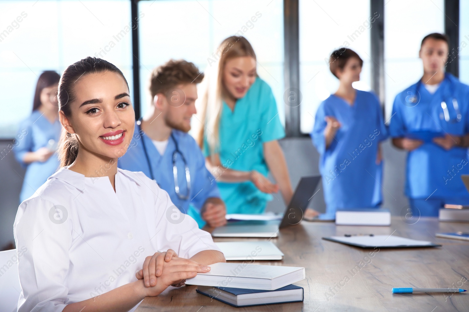 Photo of Smart medical student with her classmates in college