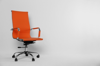 Photo of Comfortable office chair on white background, space for text