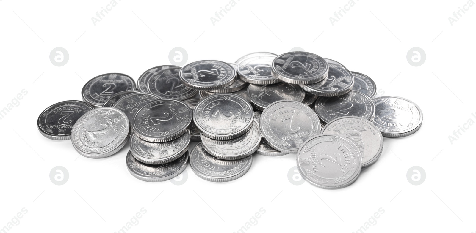 Photo of Many Ukrainian coins on white background. National currency