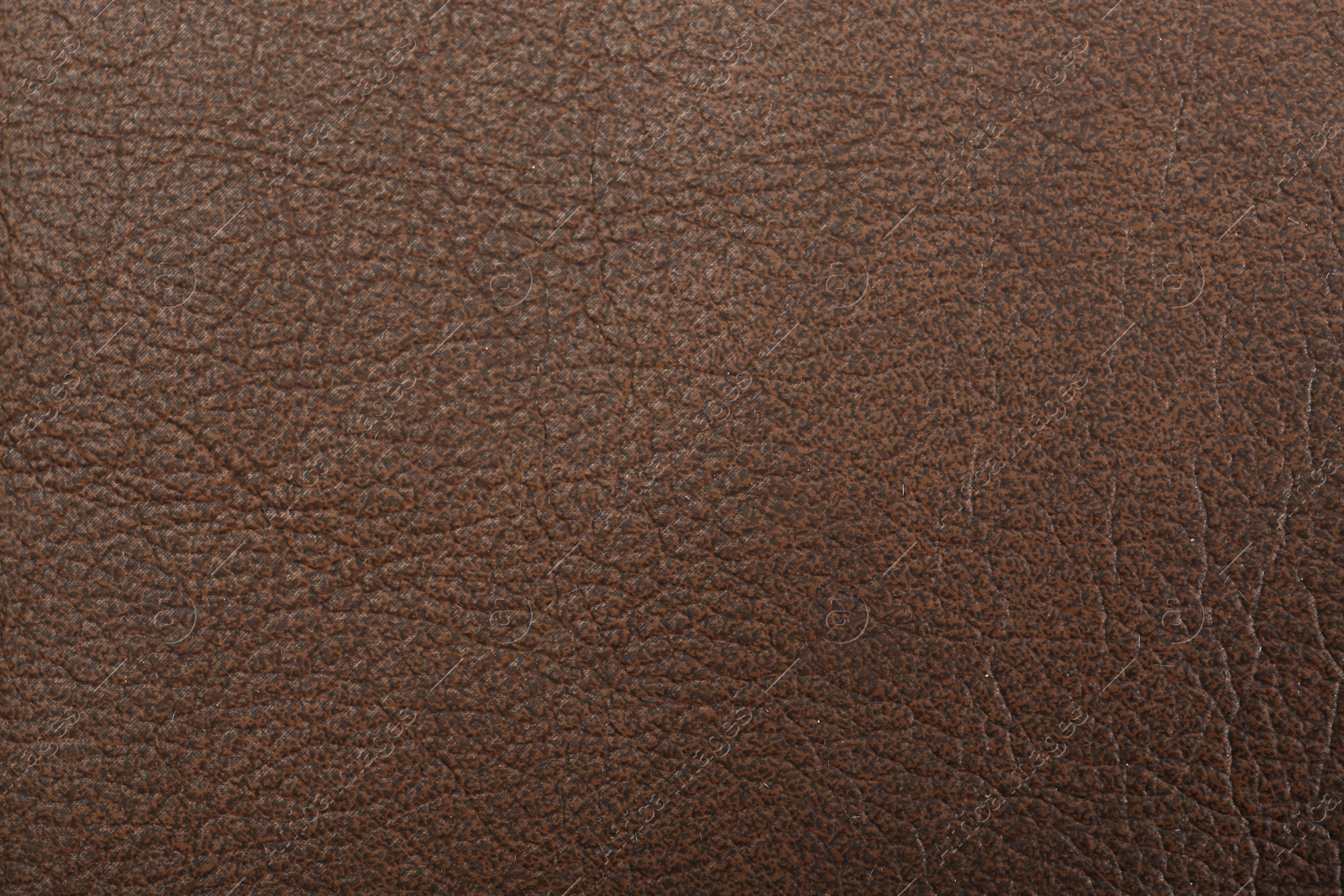 Photo of Brown natural leather as background, top view