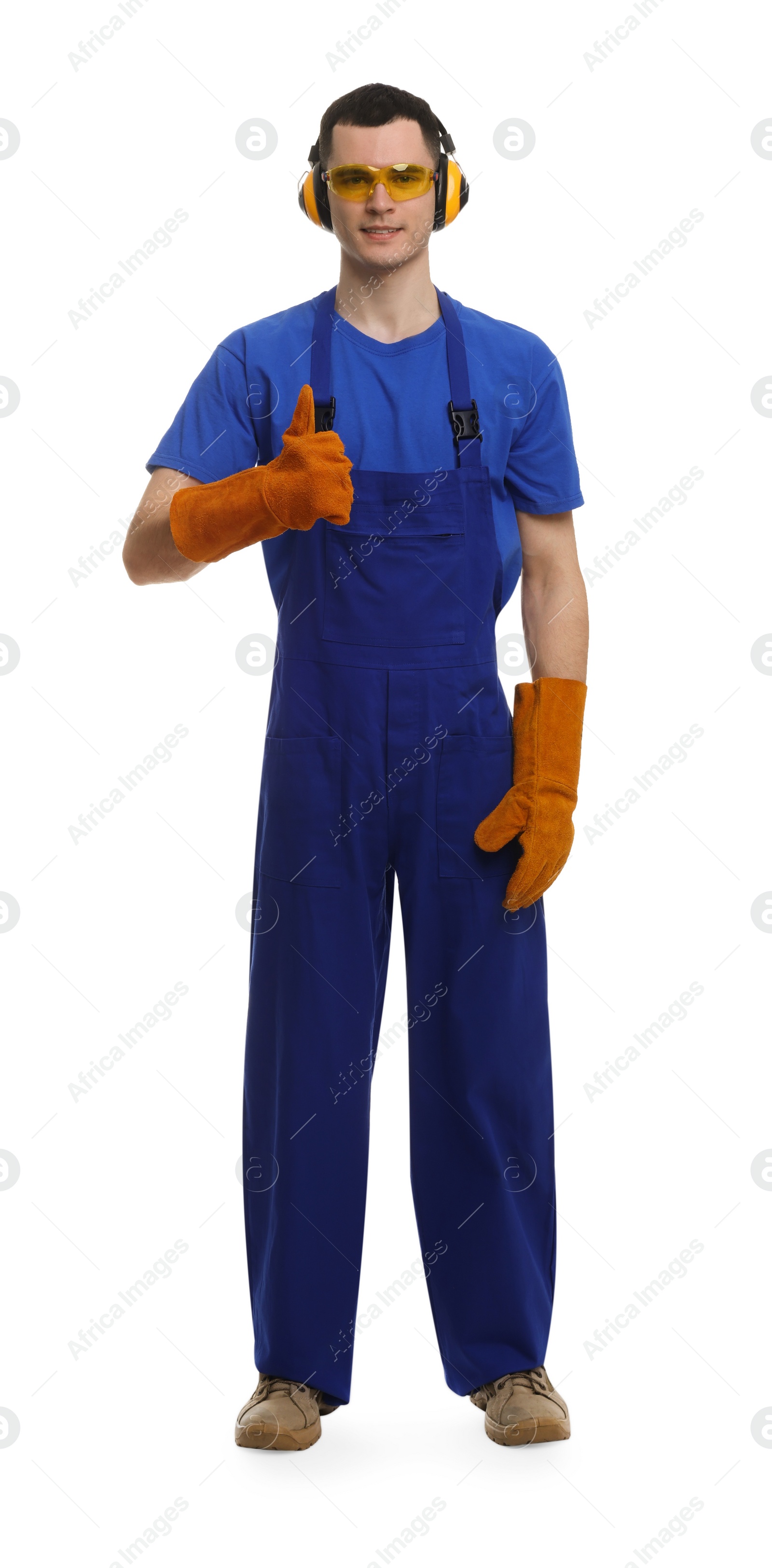 Photo of Young man wearing safety equipment and showing thumbs up on white background