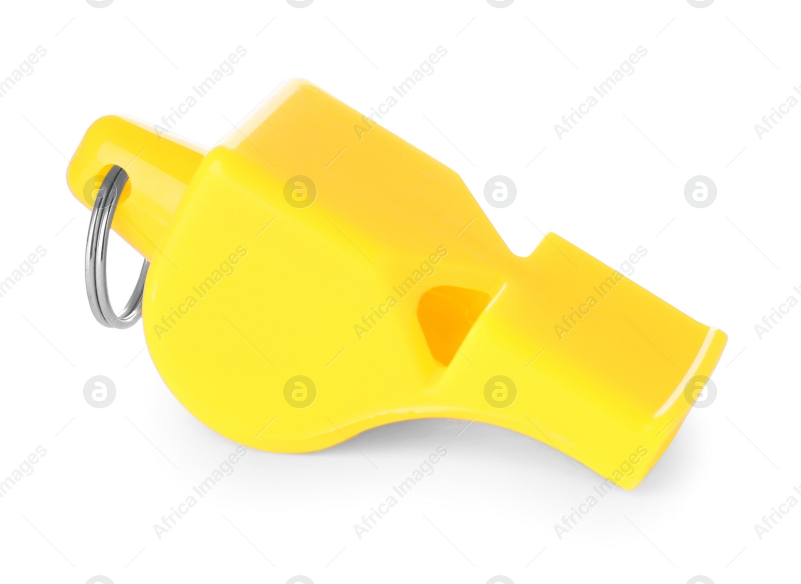 Photo of One yellow plastic whistle isolated on white