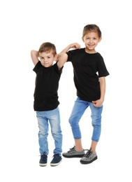 Little kids in t-shirts on white background. Mockup for design