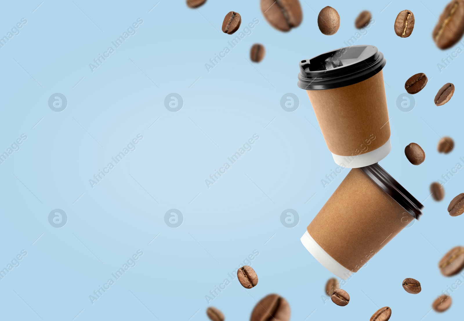 Image of Coffee to go. Paper cups and roasted beans flying on light blue background, space for text