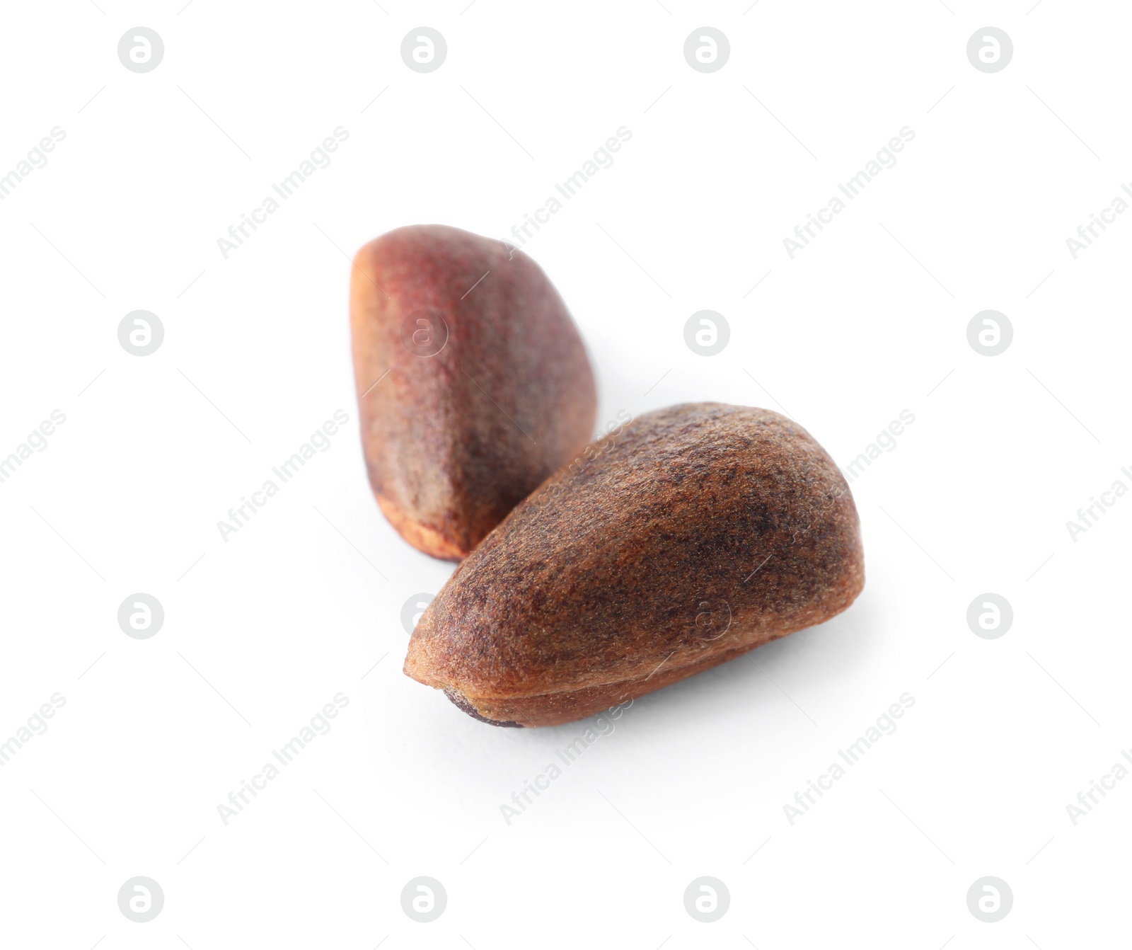 Photo of Pine nuts on white background. Healthy snack