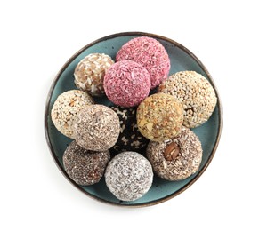 Photo of Different delicious vegan candy balls on white background, top view