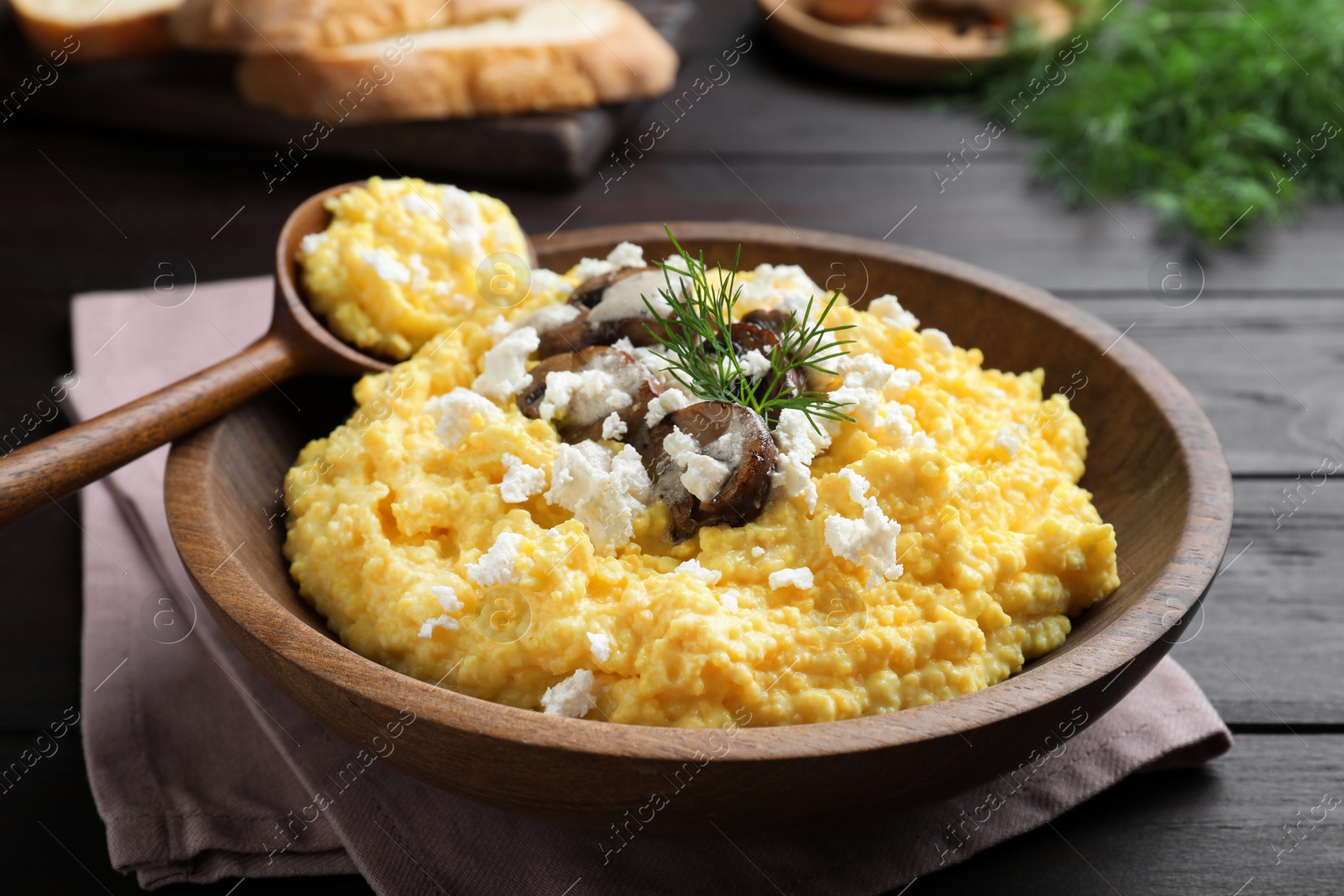 Photo of Delicious traditional banosh served on wooden table