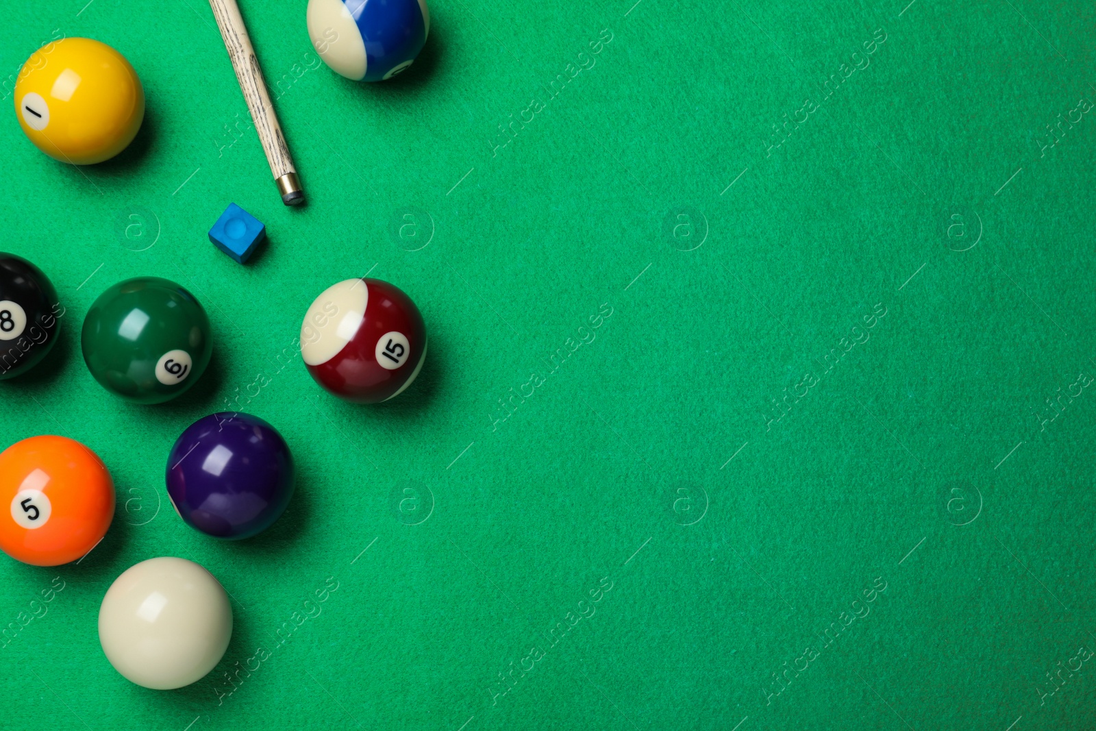 Photo of Flat lay composition with balls on billiard table, space for text