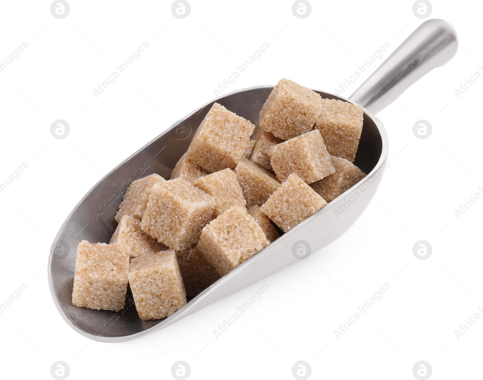 Photo of Brown sugar cubes in metal scoop isolated on white