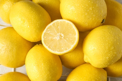 Photo of Fresh ripe lemons, close up view